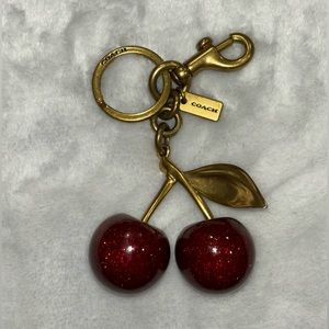 Coach. Cherry Bag Charm.